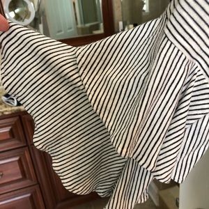 Cute black and white cold shoulder top. New with tags